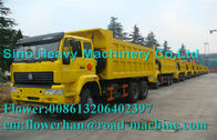 Sinotruck Howo SWZ 6 x 4 ダンプ重いダンプ トラック 12.00R20 の放射状タイヤの共同運転者 50km/H の黄色